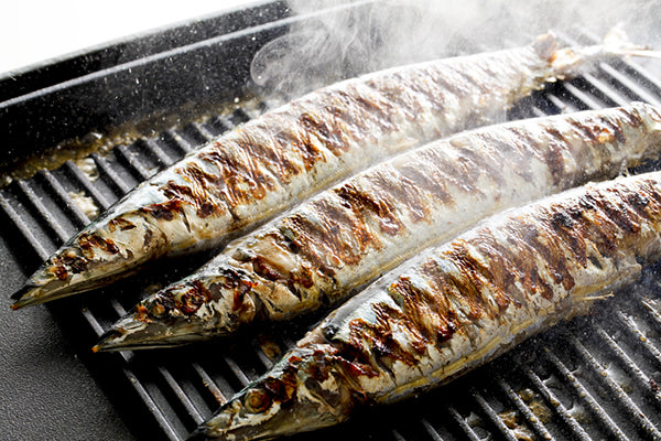 Flame grilled game fish - perfect with a stuffing of tomato, onion and Smoked Seasoning.
