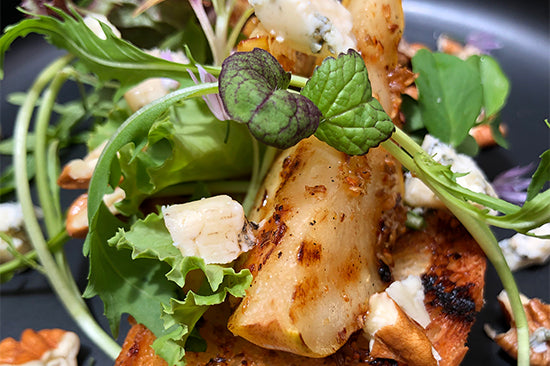 Sundried Fig Balsamic Vinegar reduction is the perfect dressing for griddled pears, gorgonzola and walnuts with fresh herbs and greens.