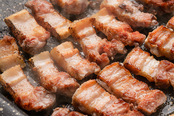 Honey & Rooibos Balsamic Vinegar reduction is the perfect finishing drizzle for grilled pork belly rashers.