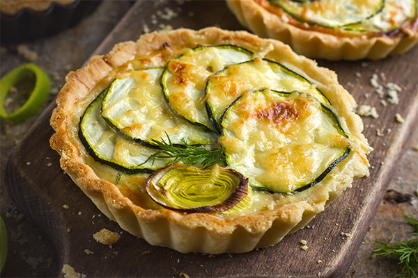 Ukuva Mamba Sauce is an excellent drizzle for courgette and leek mini quiches.