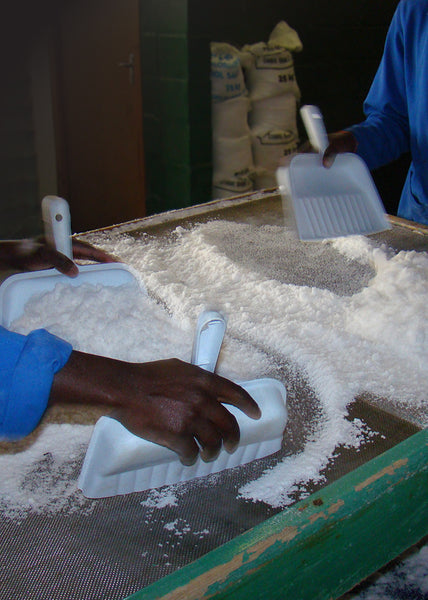 Sieving the hand harvested salt